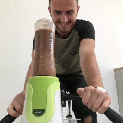 Client on a smoothie bike, chocolate and banana Pedalling Smoothie