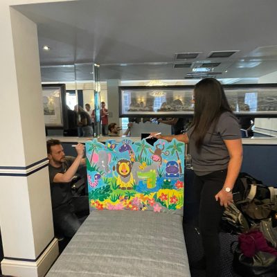 Team Painting Beds Get Ahead Festive Team Building Challenge
